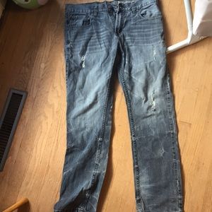 Cut and sew slim fit jeans distressed